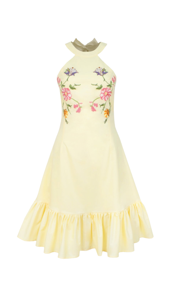 Yellow dress with floral embroidery on a white background
