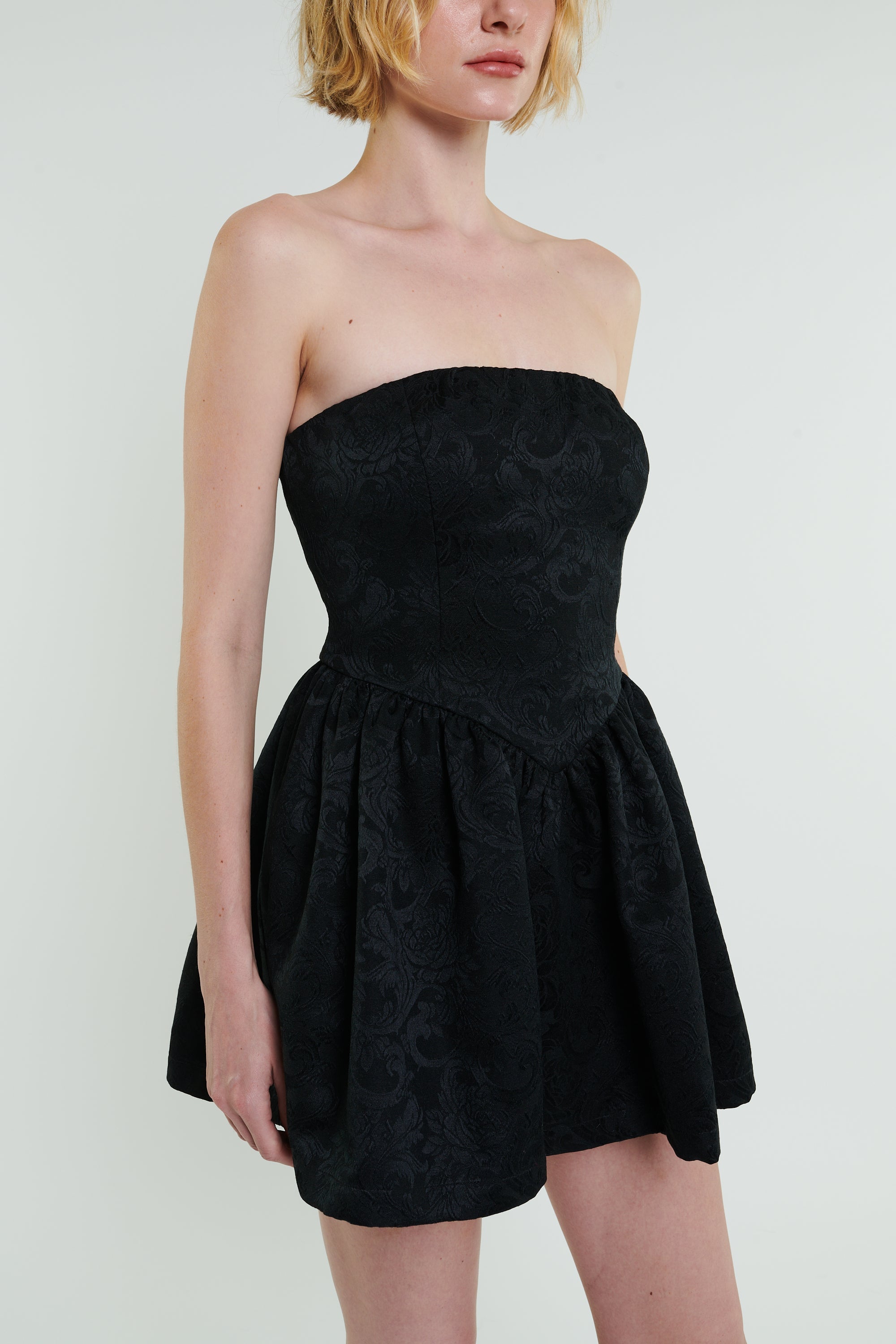 Roxanne Mini Dress in Black by Madeline Marie