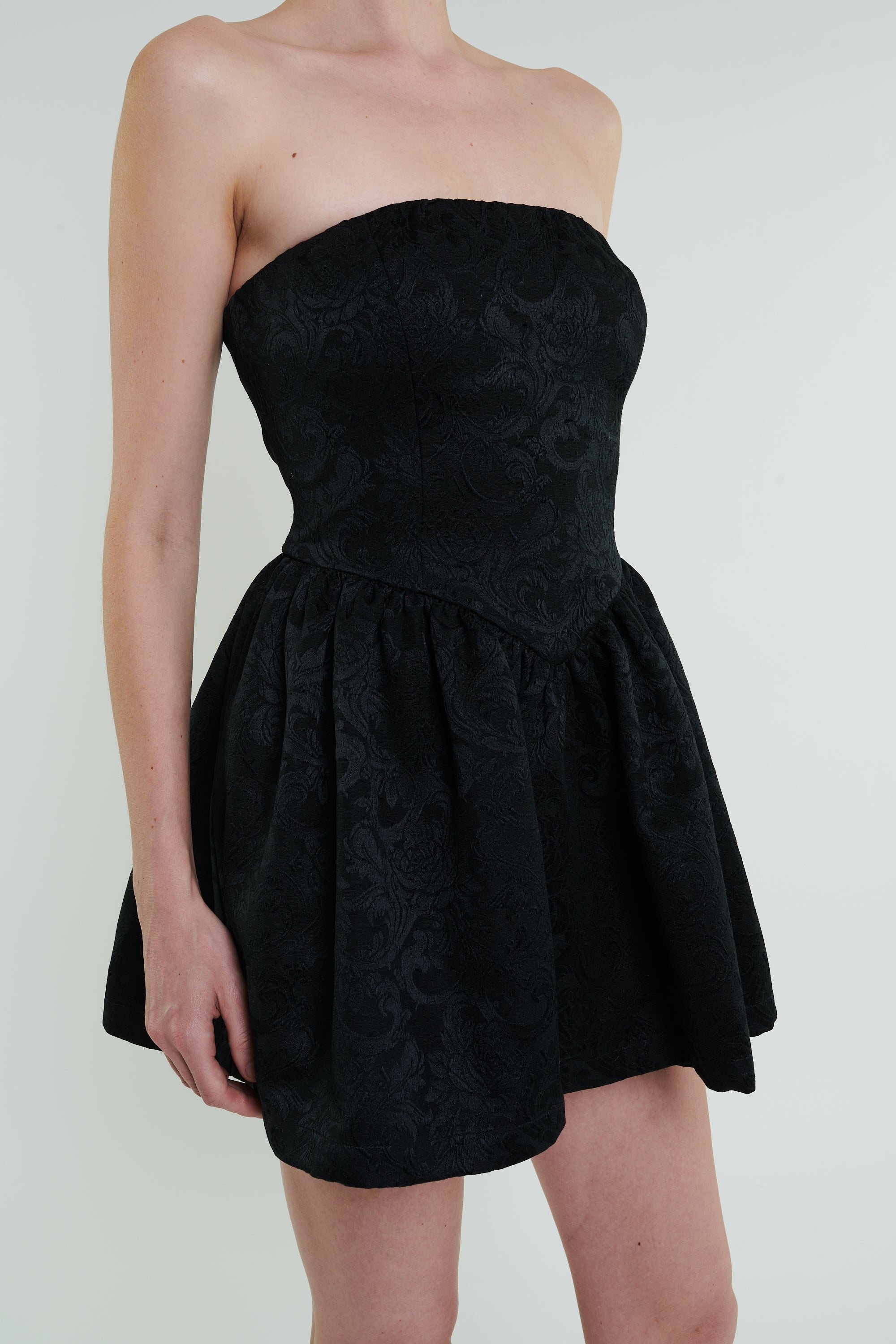 Roxanne Mini Dress in Black by Madeline Marie