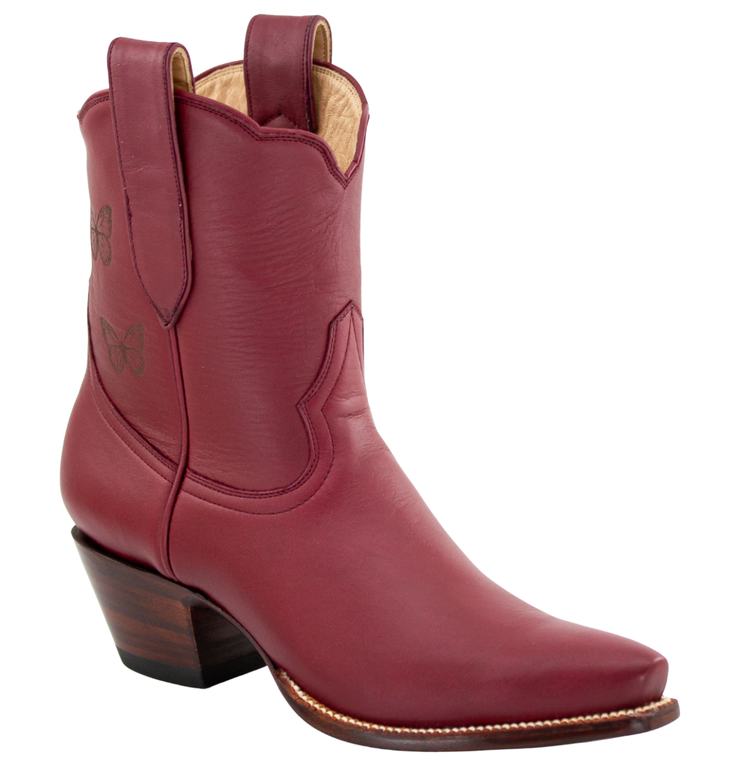 Red cowboy boot on a white background