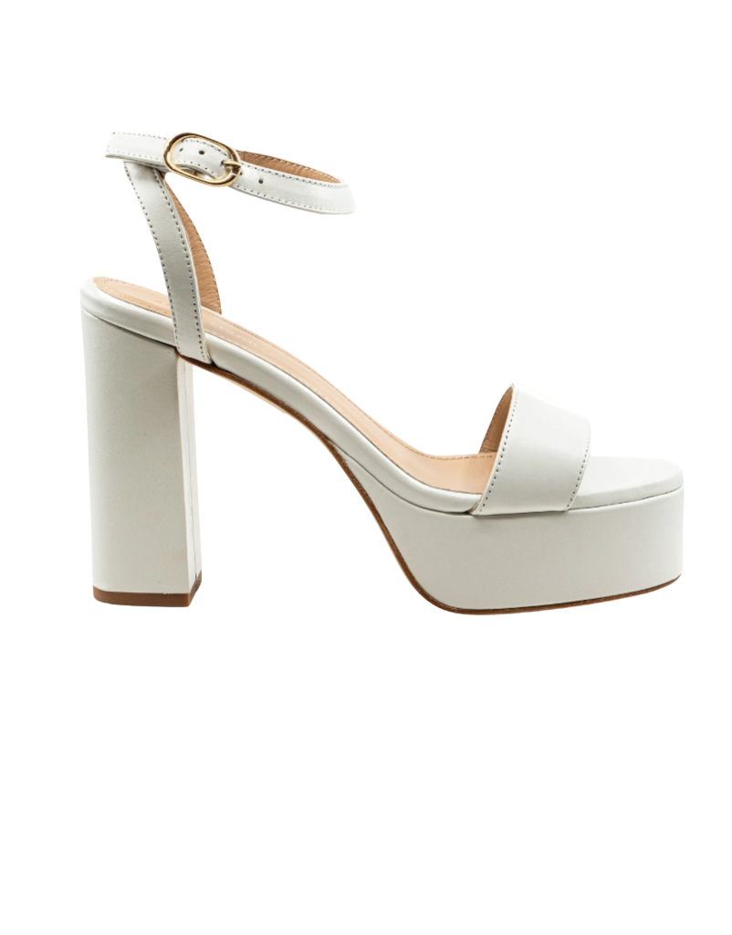 White platform sandal with a block heel on a white background