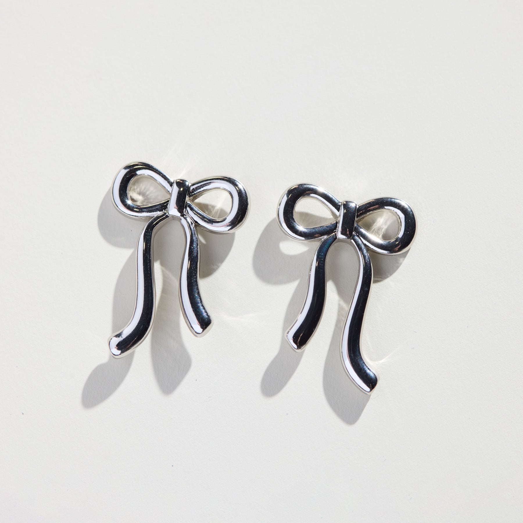 Silver Vintage Bow Studs by Nickel & Suede