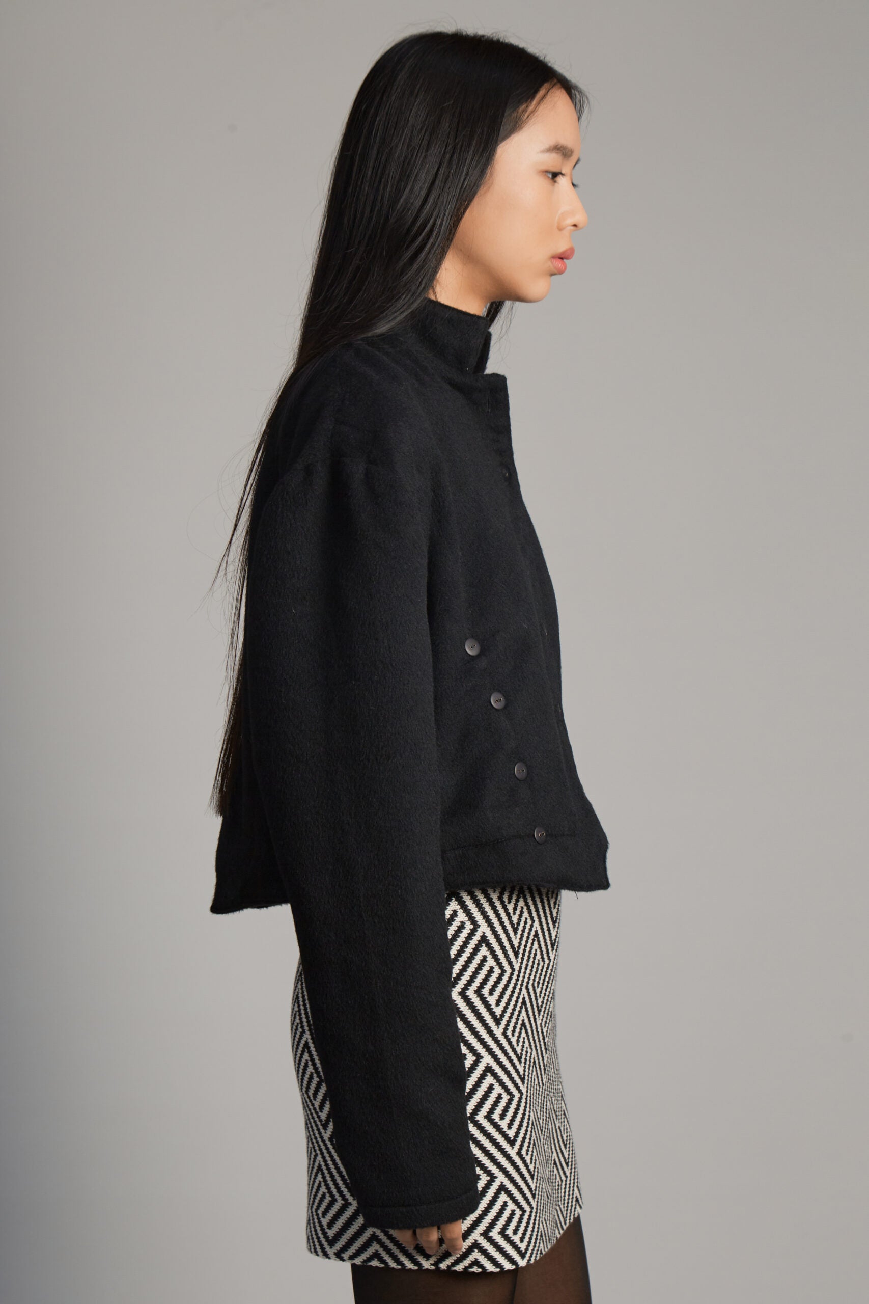 Capitana Alpaca black jacket by MUNA