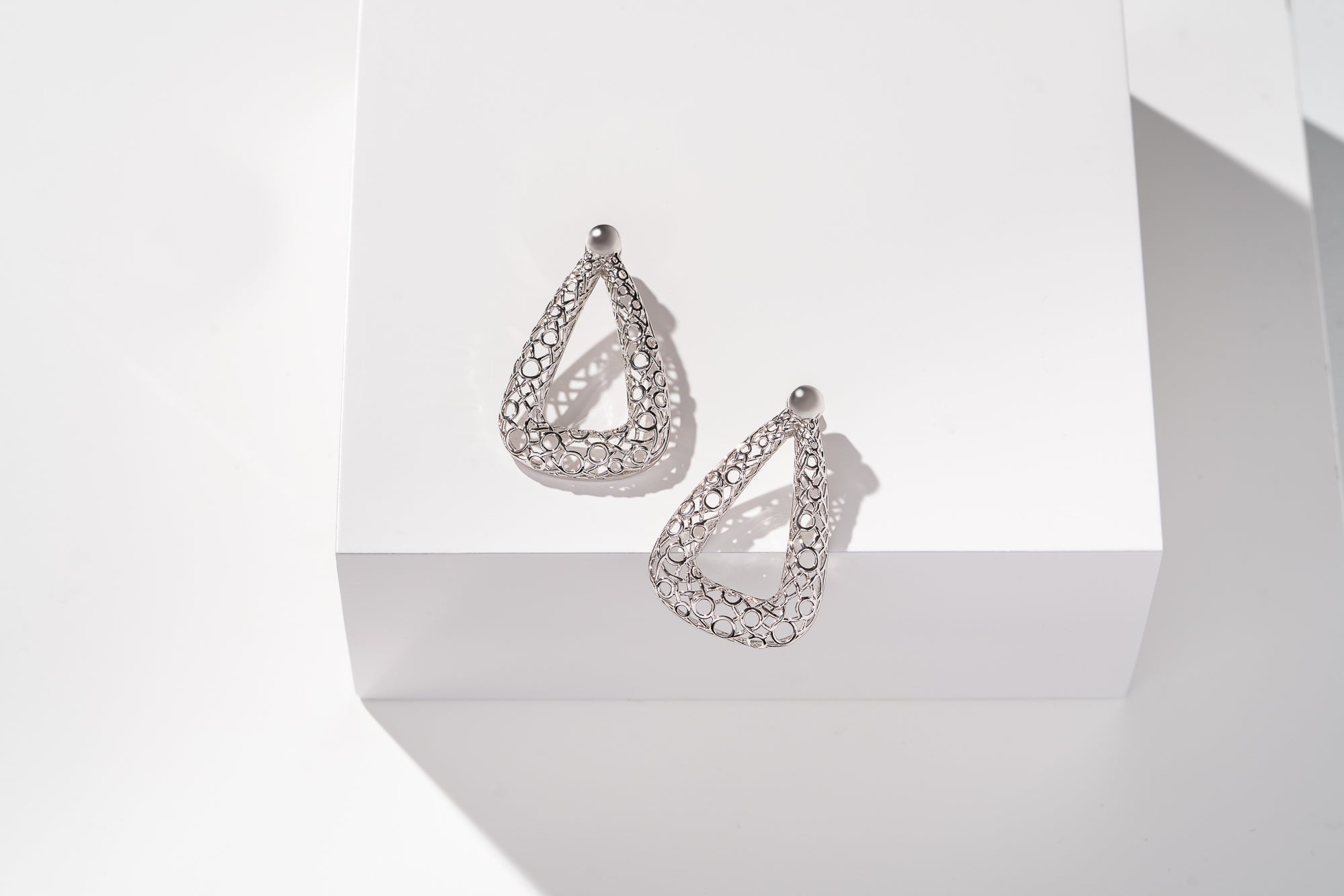 Enmeshed-White Gold by Herice Henderson