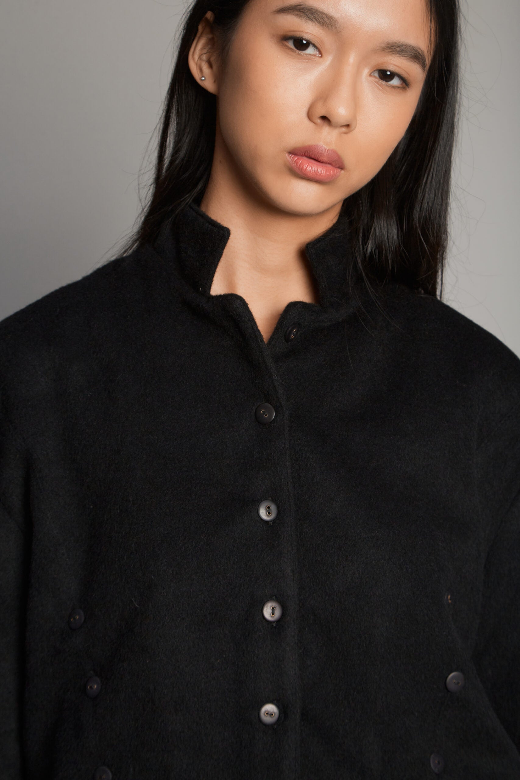 Capitana Alpaca black jacket by MUNA