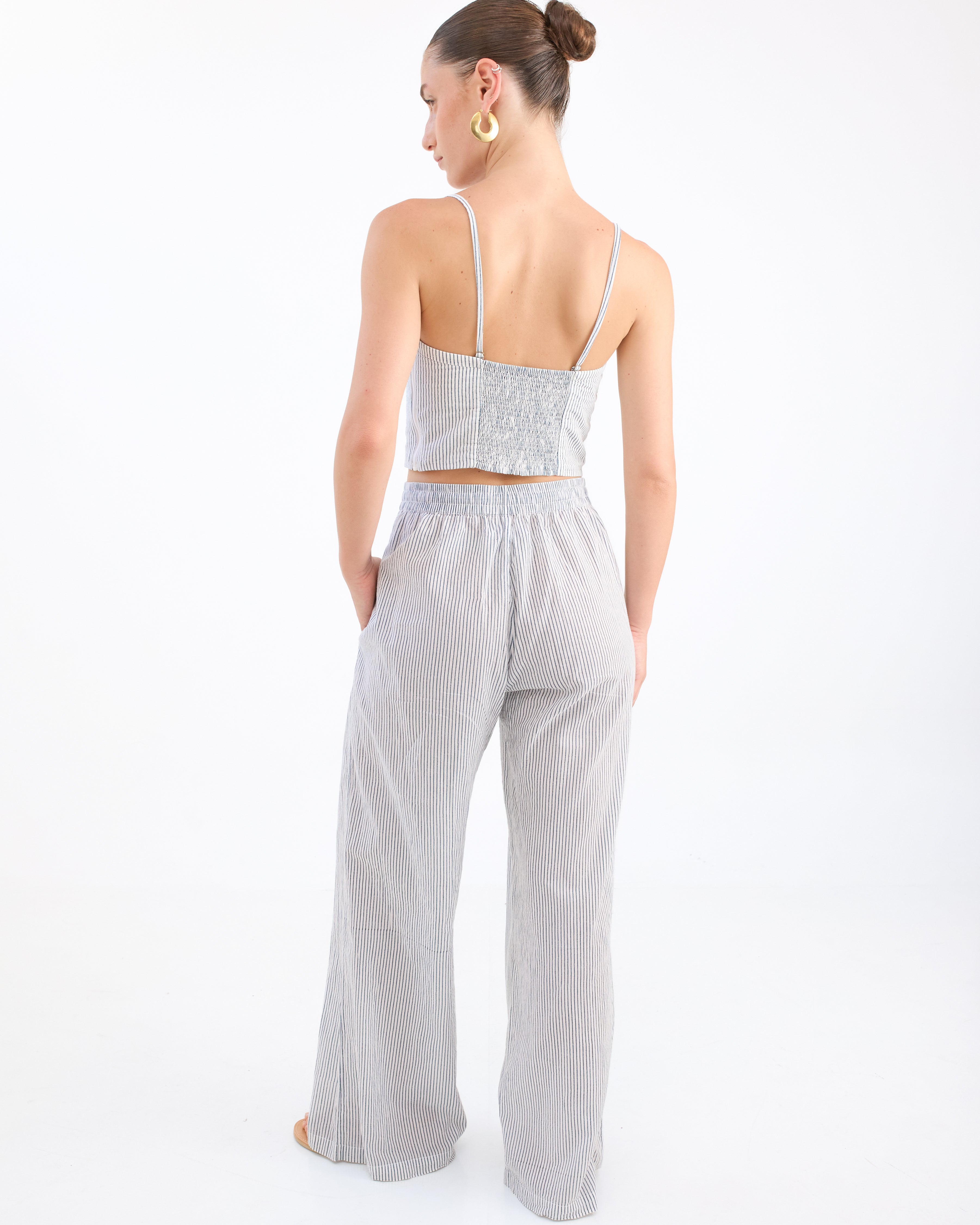 Blue striped flowy pants on sale