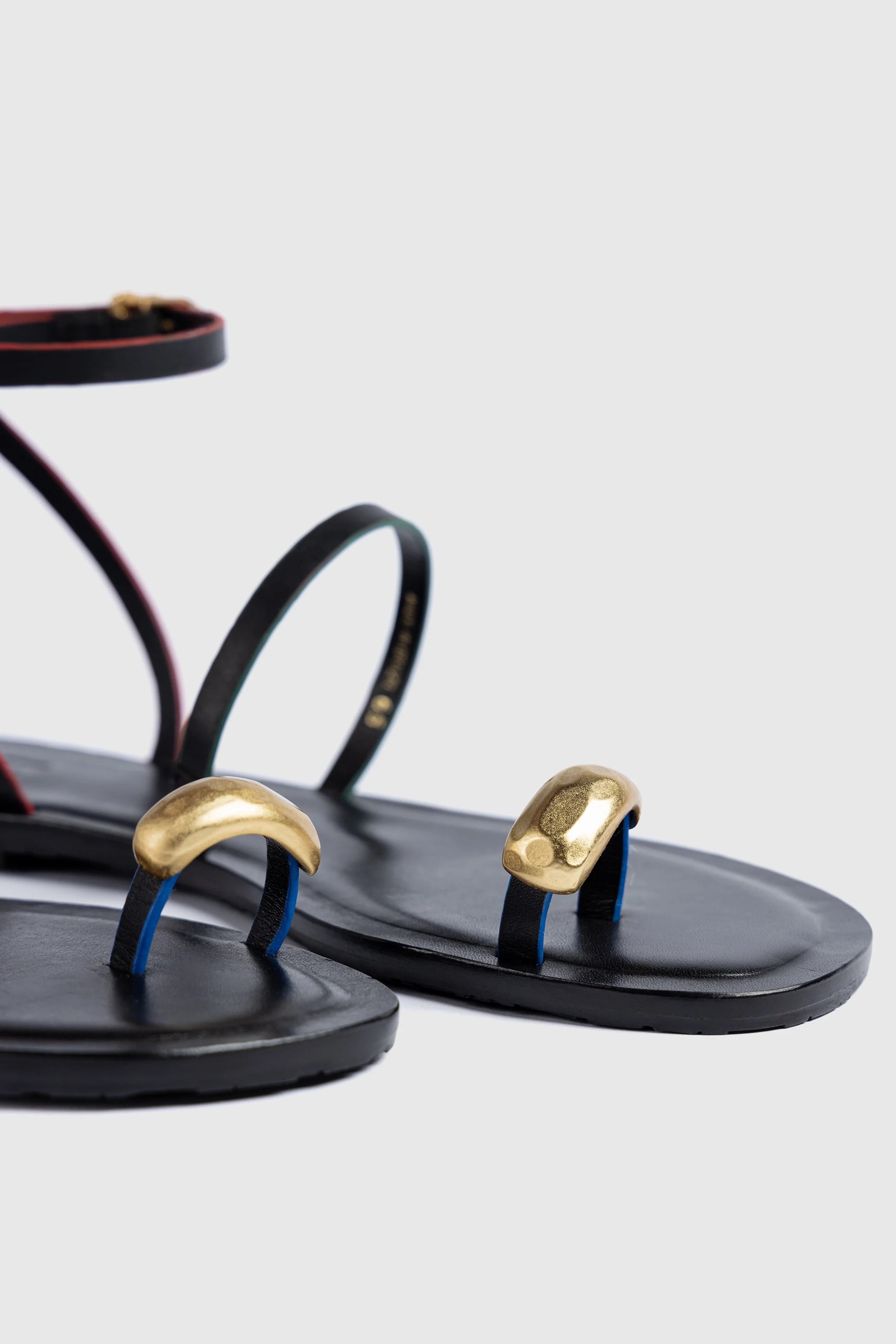Biarritz Flat Sandal In Black Leather by Larroudé
