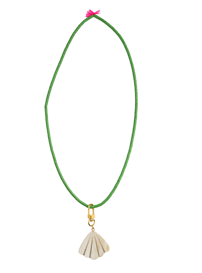 Green necklace with a shell pendant on a white background