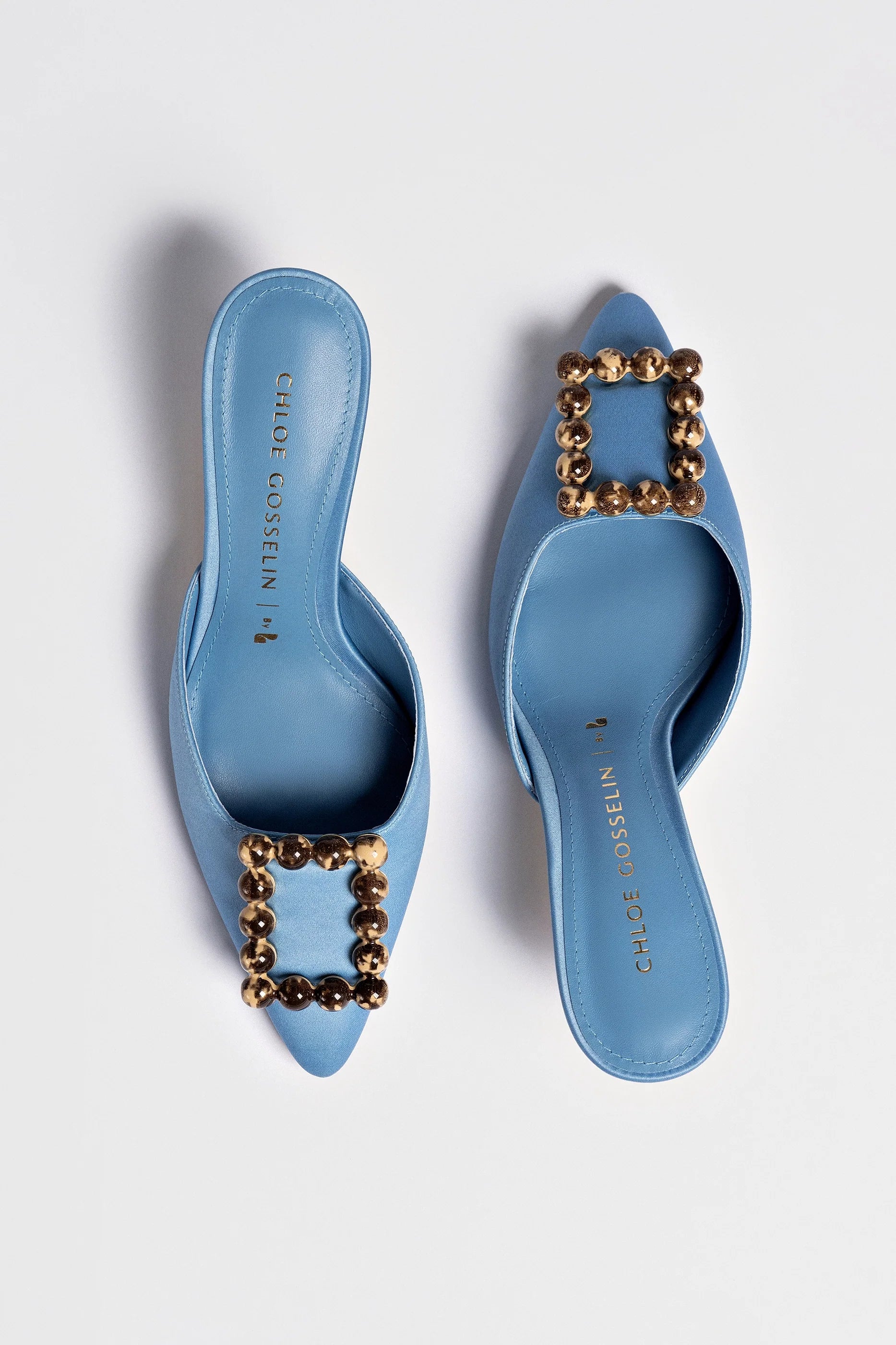 Chloe Gosselin by Larroudé Ava Mule In Blue Satin by Larroudé