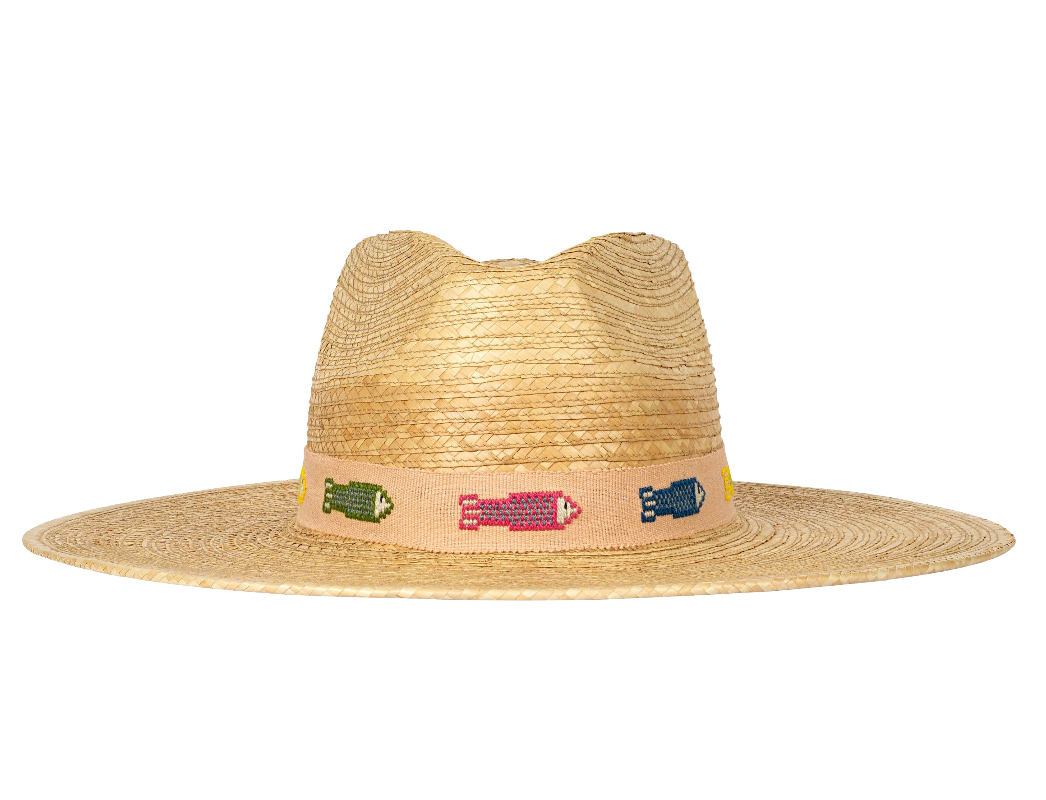 Straw hat with embroidered designs on a white background