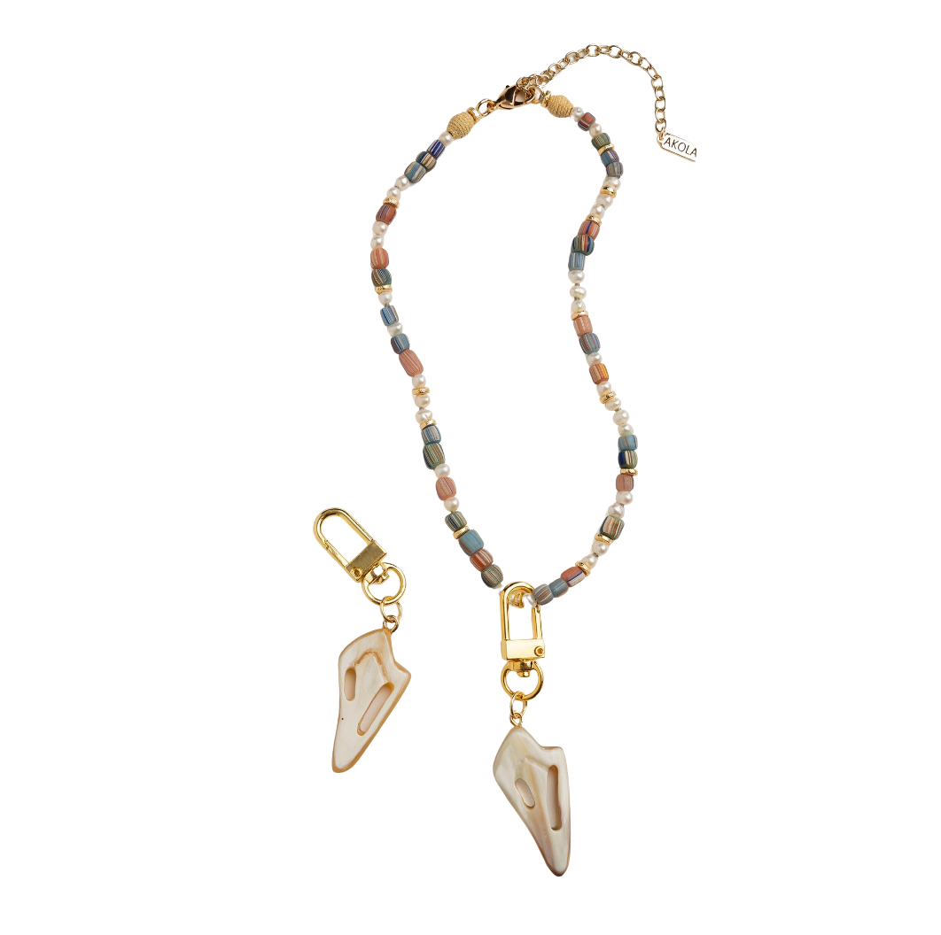 Cut Conch Charm in Hand-Carved Horn by Lilly Sisto x Akola