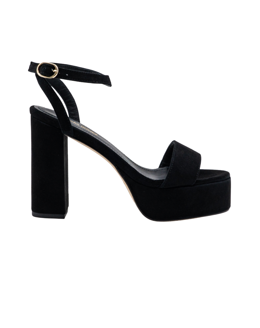 A black platform sandal with a chunky block heel, a single wide toe strap, and an ankle strap with a gold buckle, shown from a side profile on a white background.