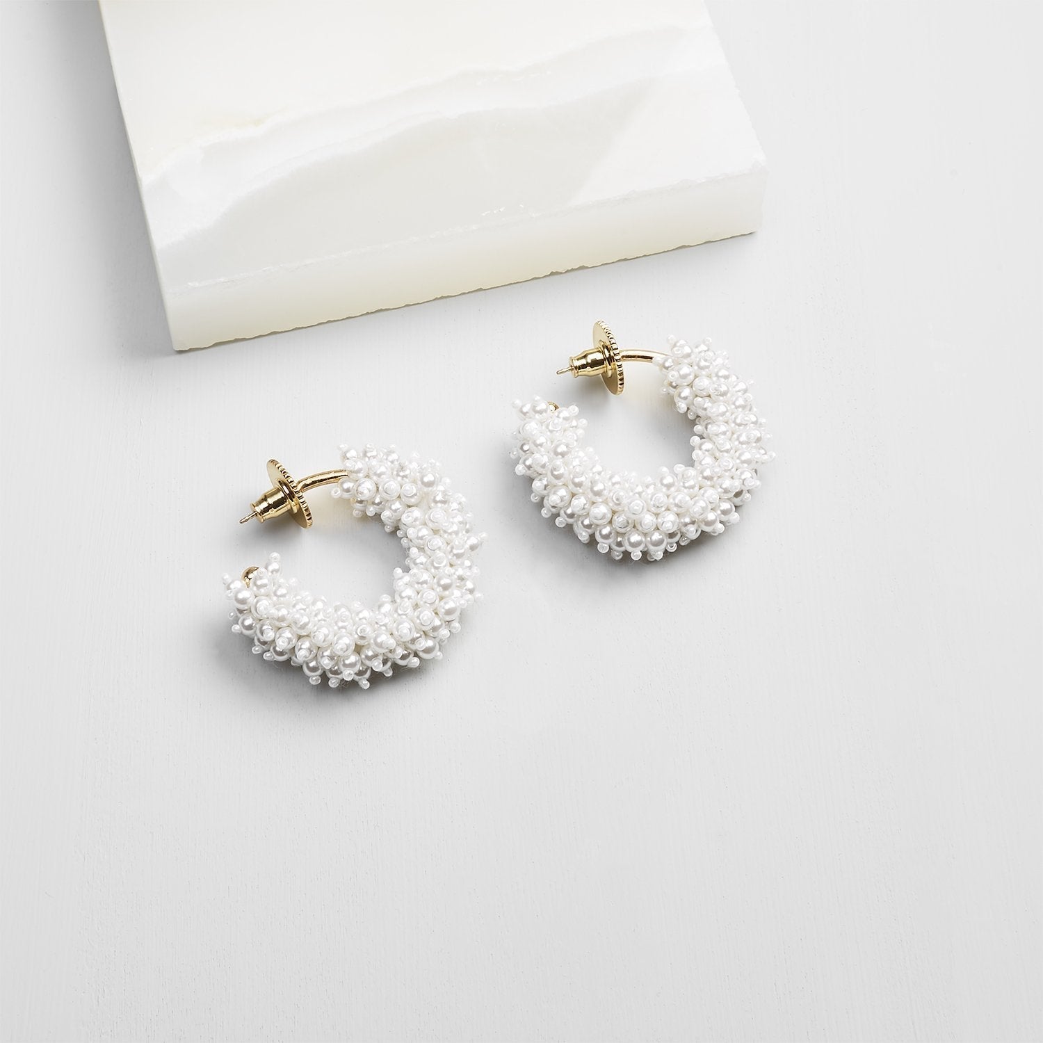 Taylor Mini Hoop Earrings White/Gold by Mignonne Gavigan