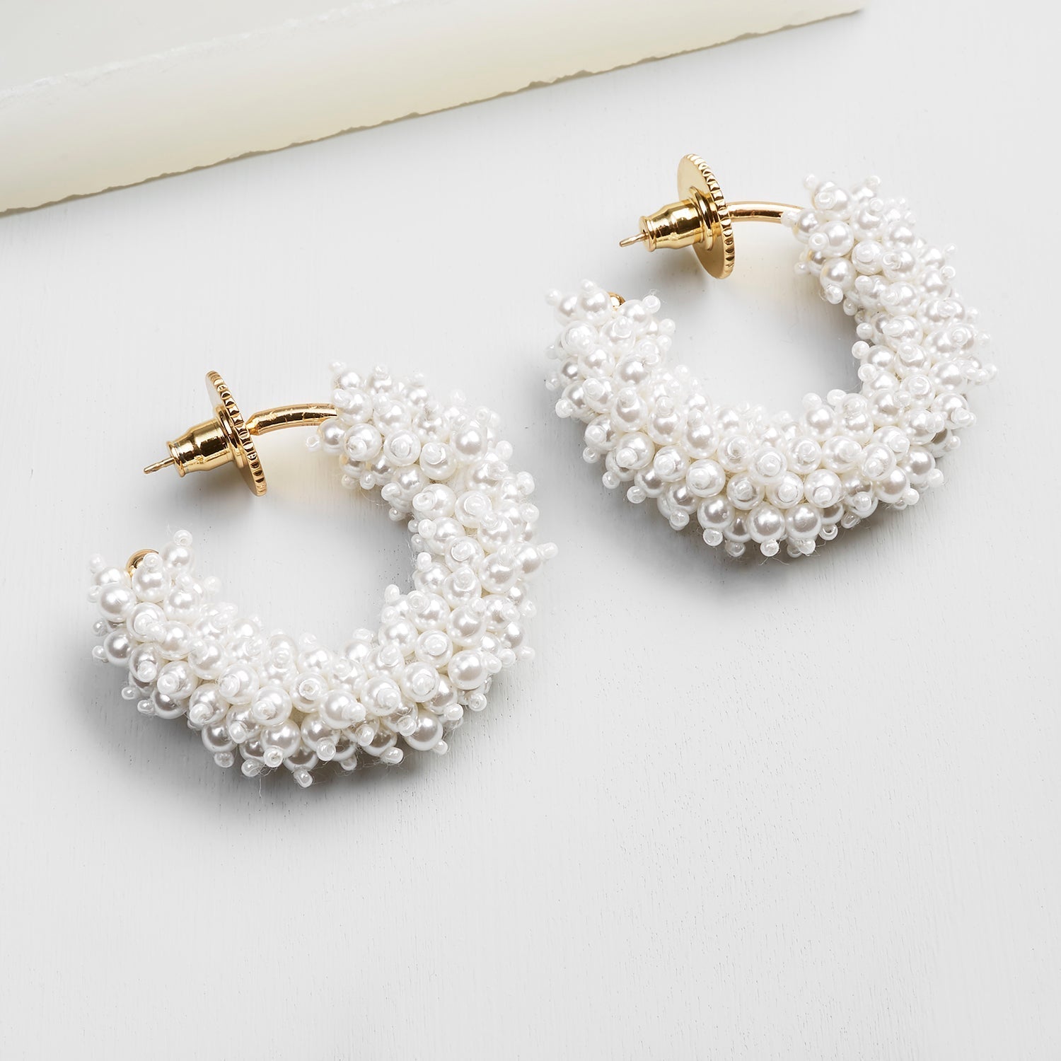 Taylor Mini Hoop Earrings White/Gold by Mignonne Gavigan