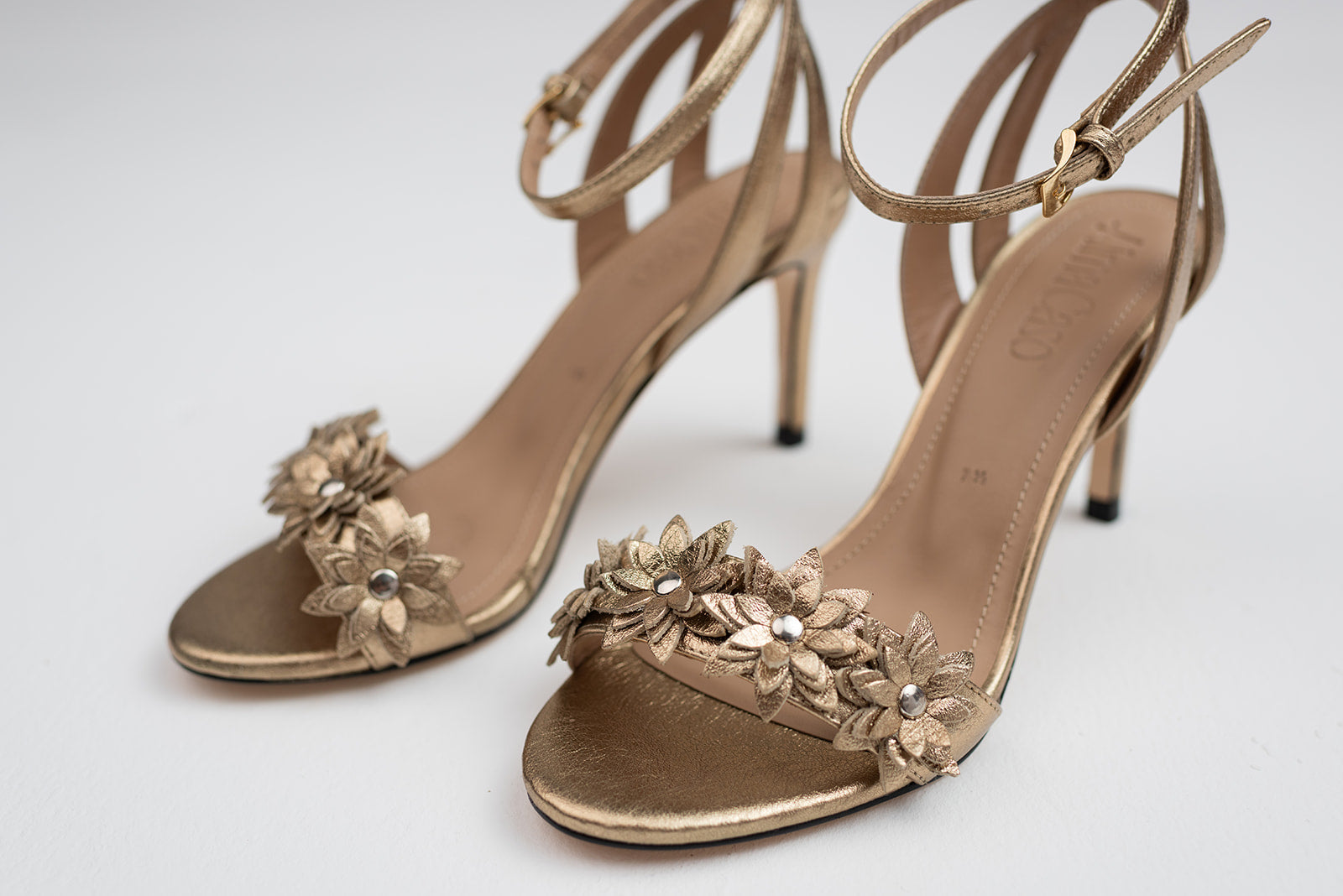 Lucia Gold Floral Sandal by Alma Caso