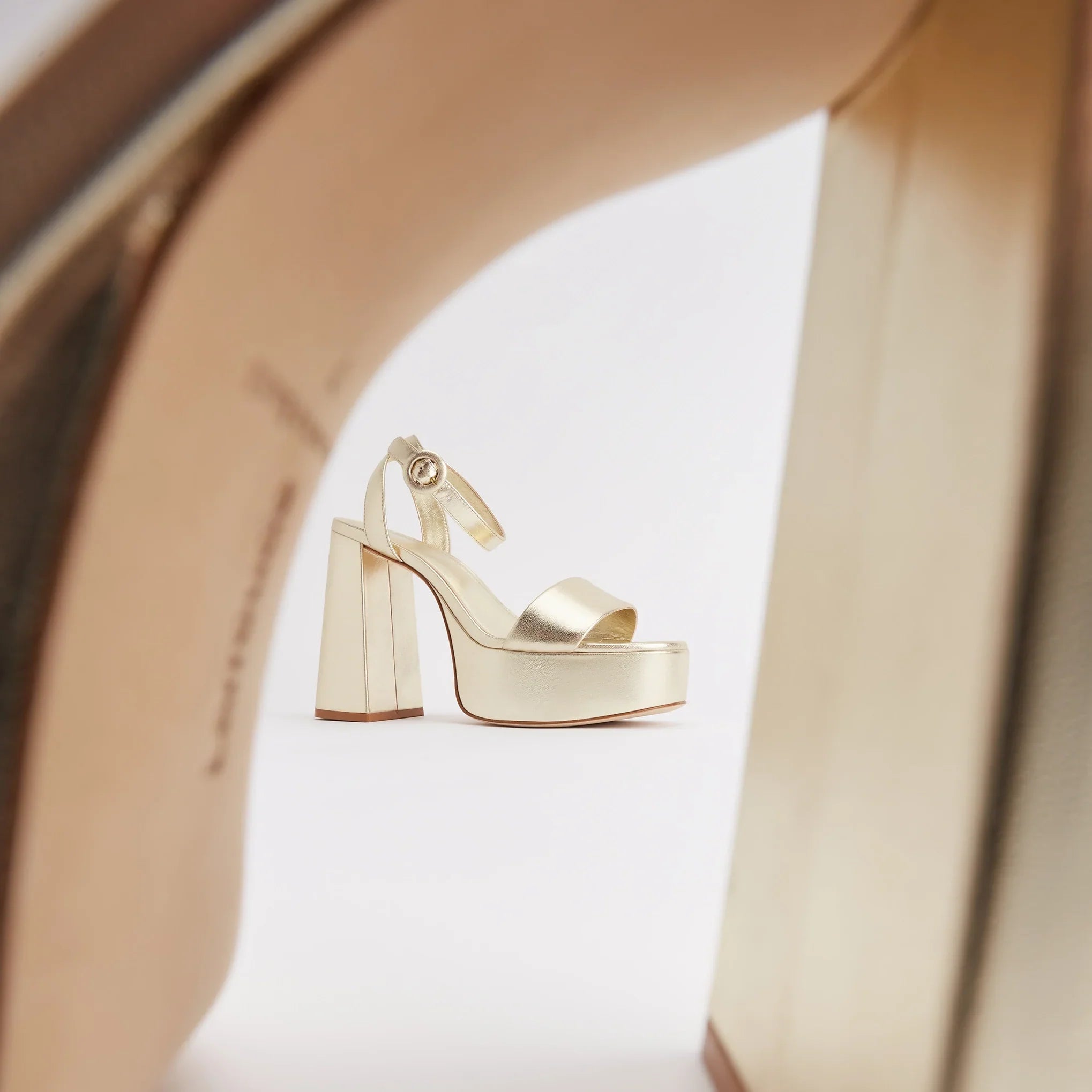 Dolly Sandal In Gold Metallic Leather by Larroudé