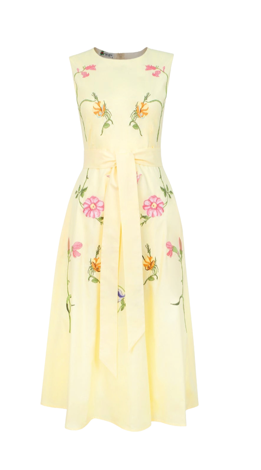 Yellow dress with floral patterns on a white background