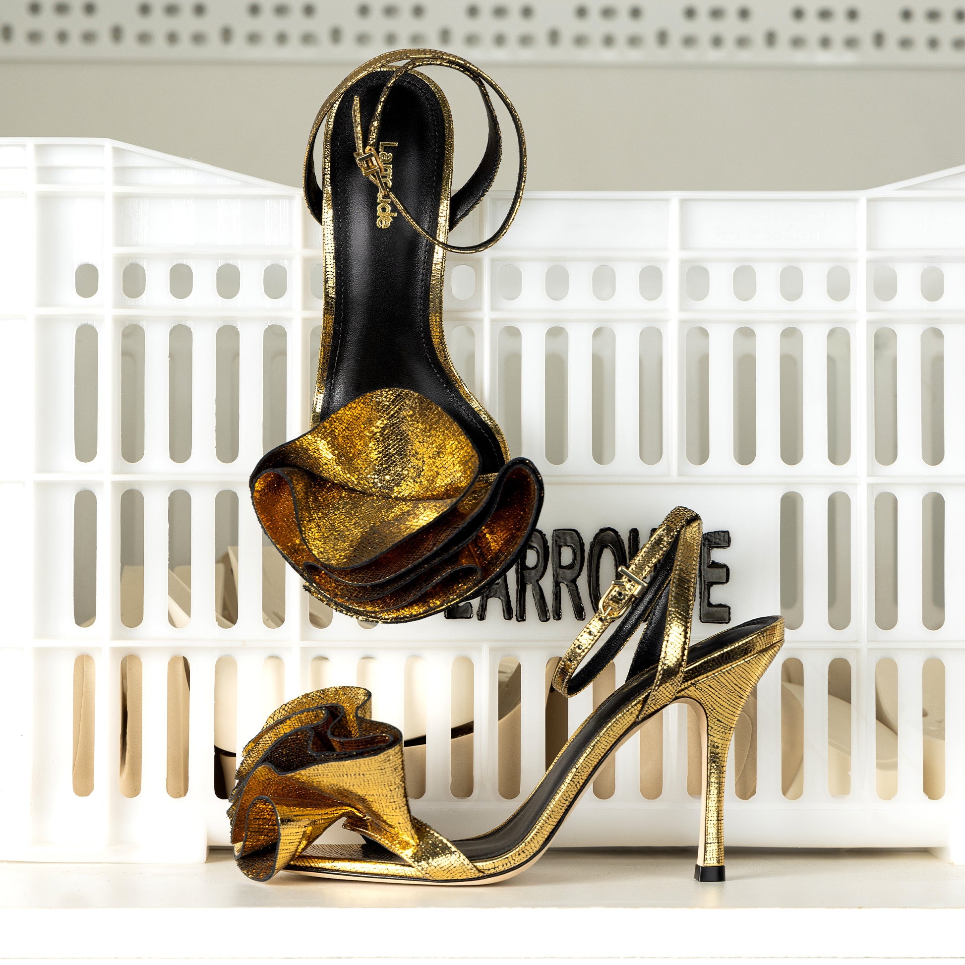 Penelope Sandal In Gold Cracked Metallic Leather by Larroudé