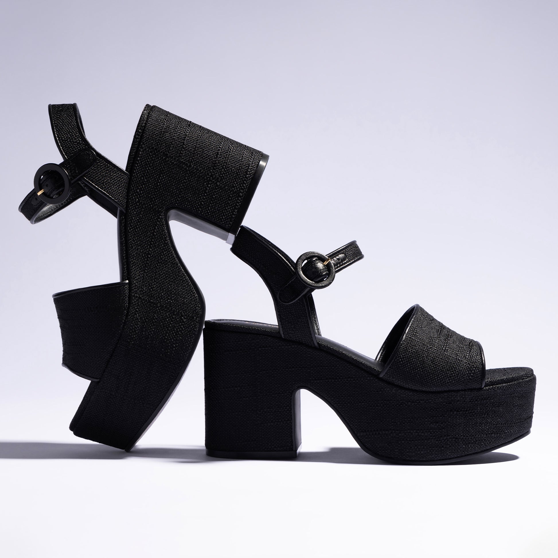 Miso Platform Strap Sandal In Black Raffia by Larroudé