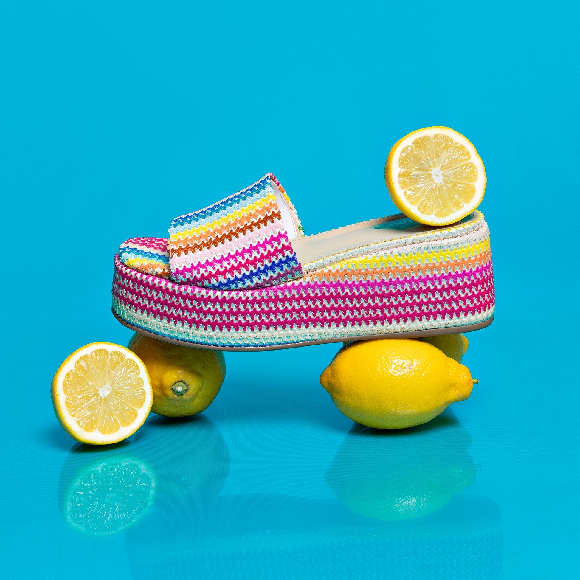Alex Flatform Mule In Rainbow Raffia by Larroudé