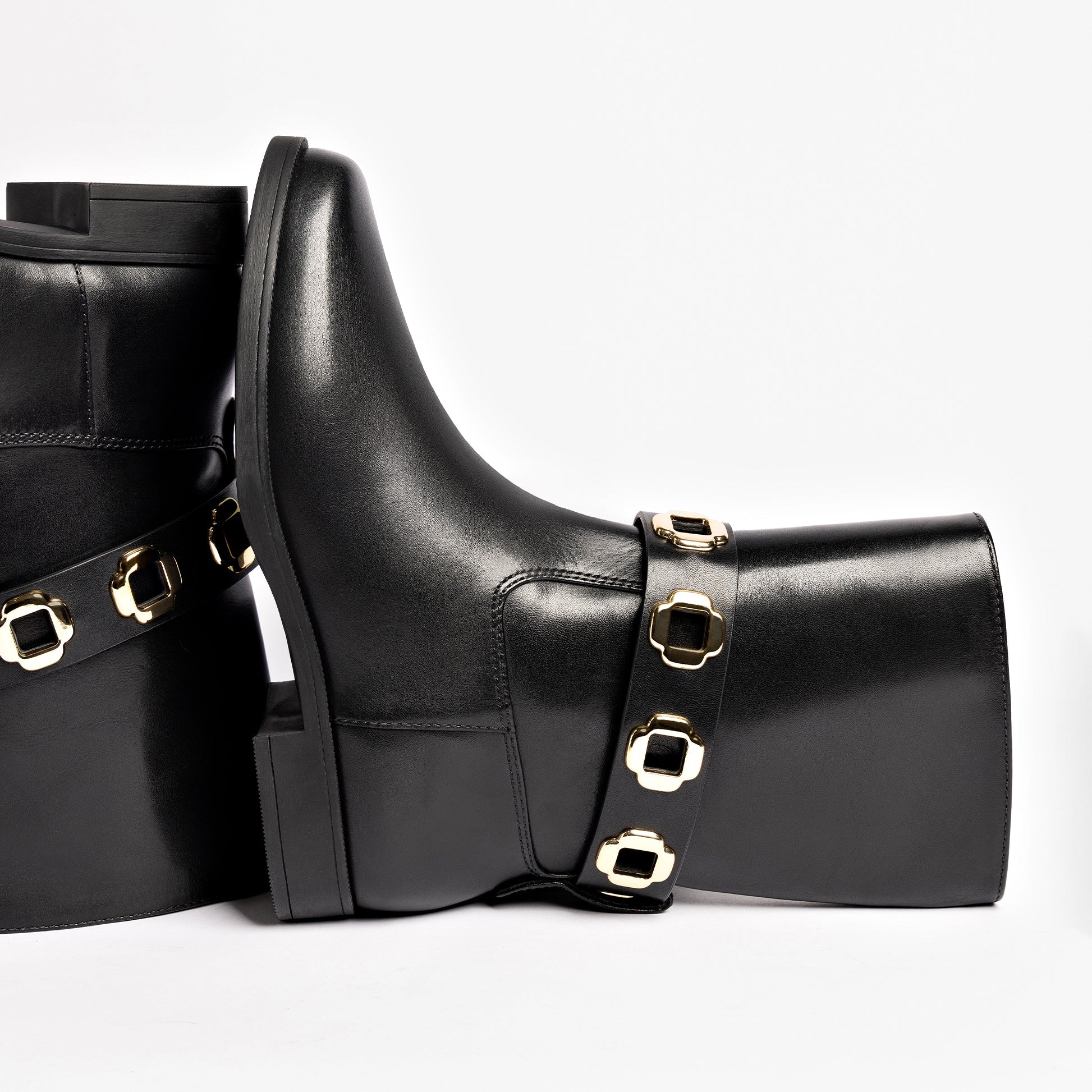 Milan Flat Bootie In Black Water Resistant Leather by Larroudé