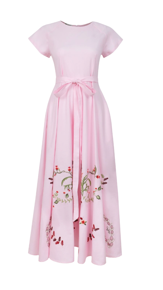 Pink dress with floral embroidery on a white background
