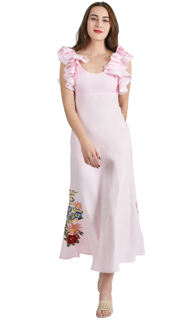 Woman wearing a pink dress with floral embroidery on a white background
