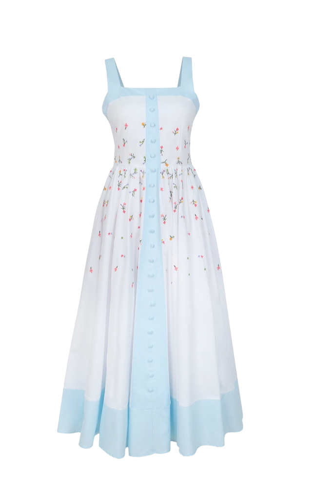 White dress with blue accents and floral pattern on a white background