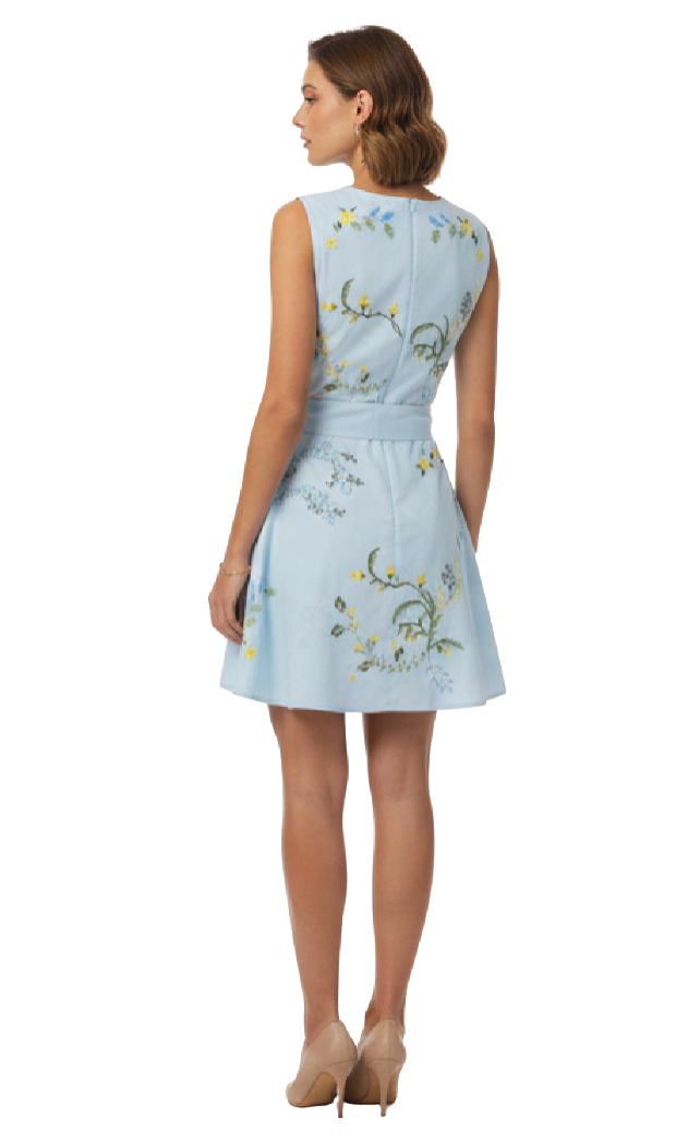 Light blue dress with floral embroidery on a white background