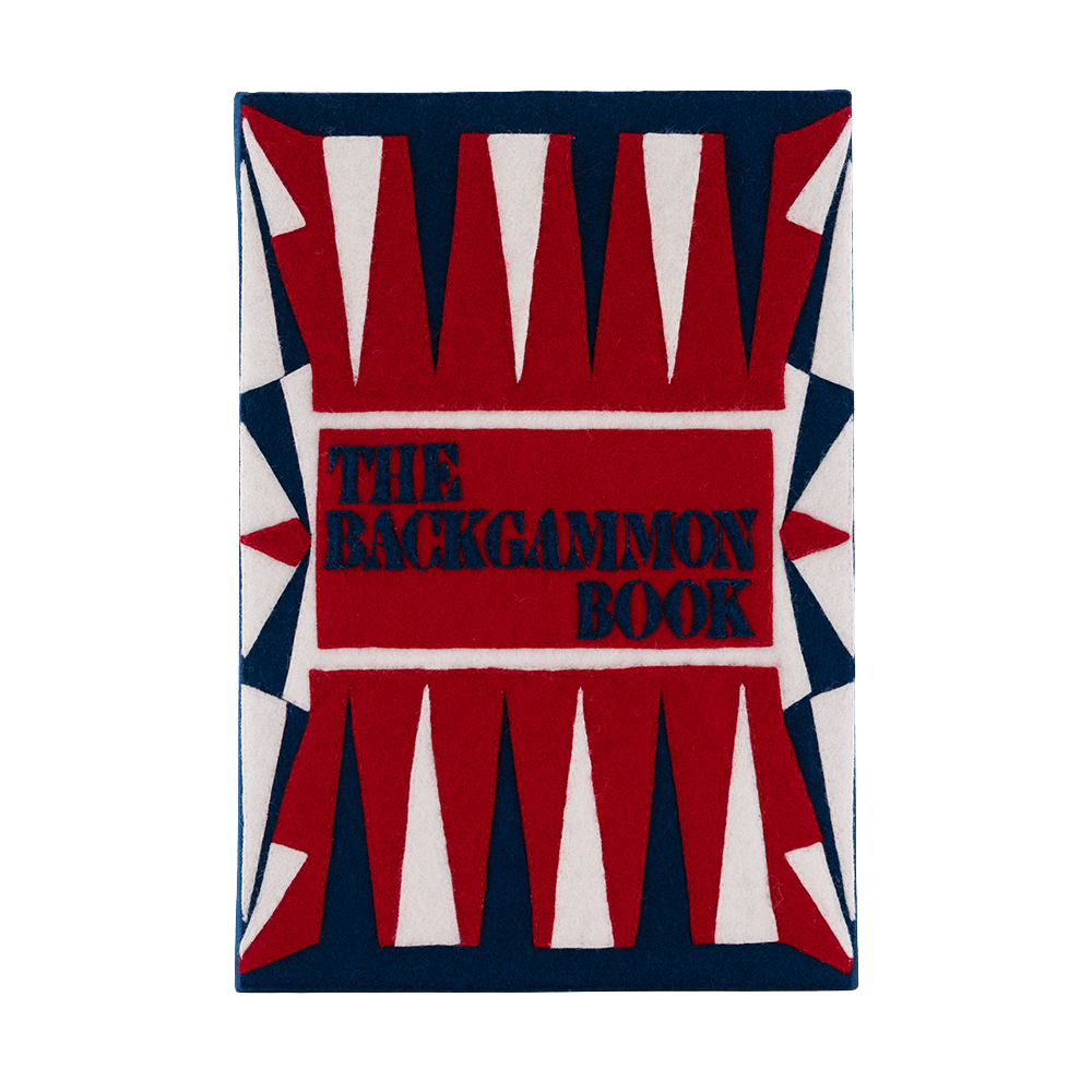 A square book cover for 'The Backgammon Book' featuring a bold red, white, and navy blue geometric design with the title in navy text on a red background.