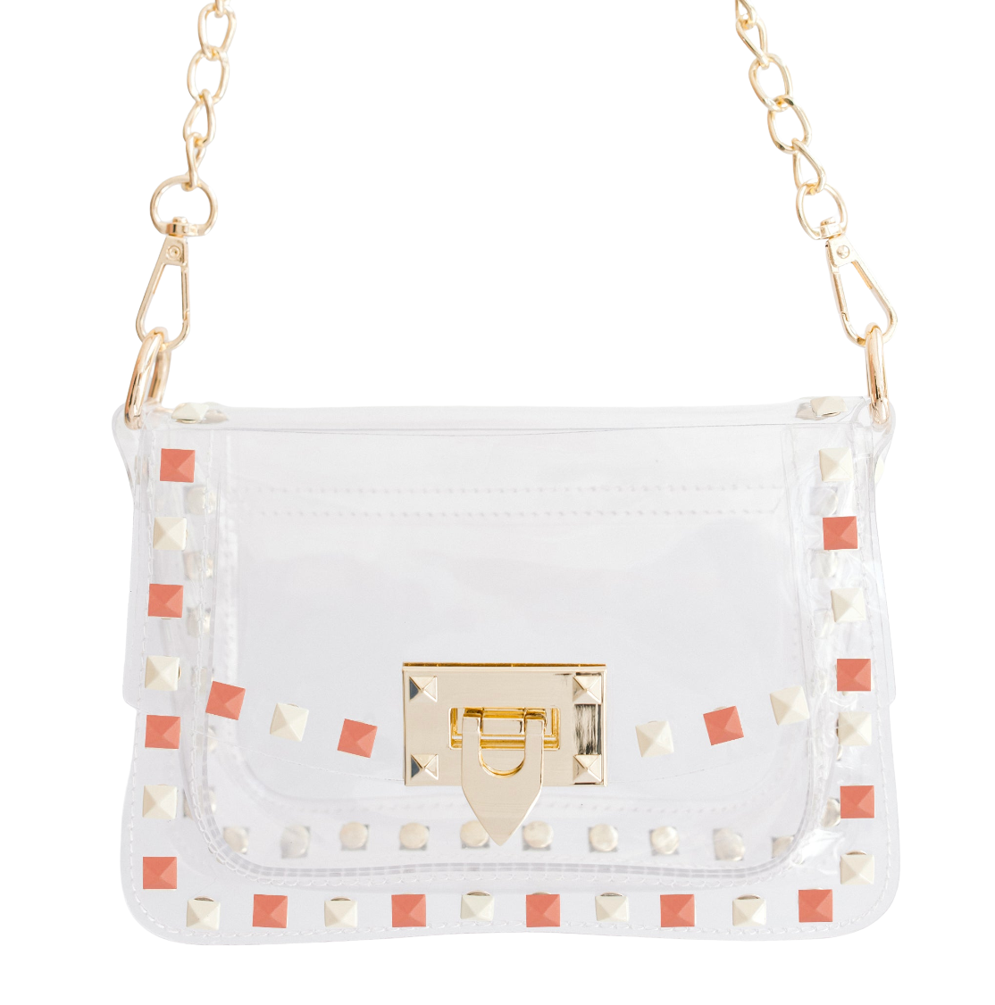 A clear vinyl shoulder bag with gold chain straps, a gold front clasp, and rows of gold and pink pyramid studs along the edges.