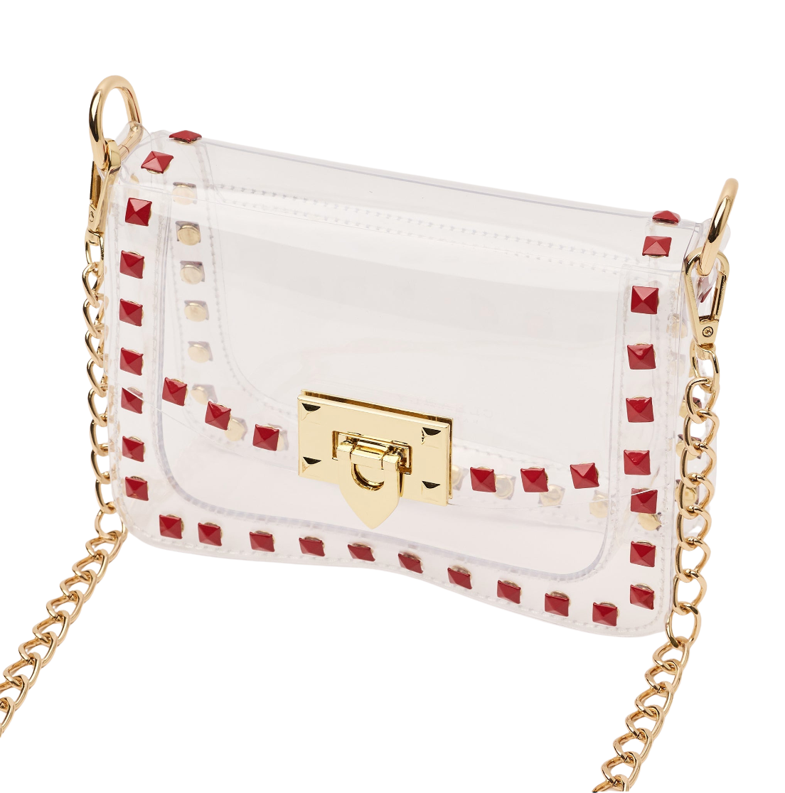 A white faux-leather shoulder bag with a transparent front flap, decorated with red and clear rhinestone studs along the edges and a gold-tone turn-lock clasp. It features a gold chain strap and is shown on a plain white background.