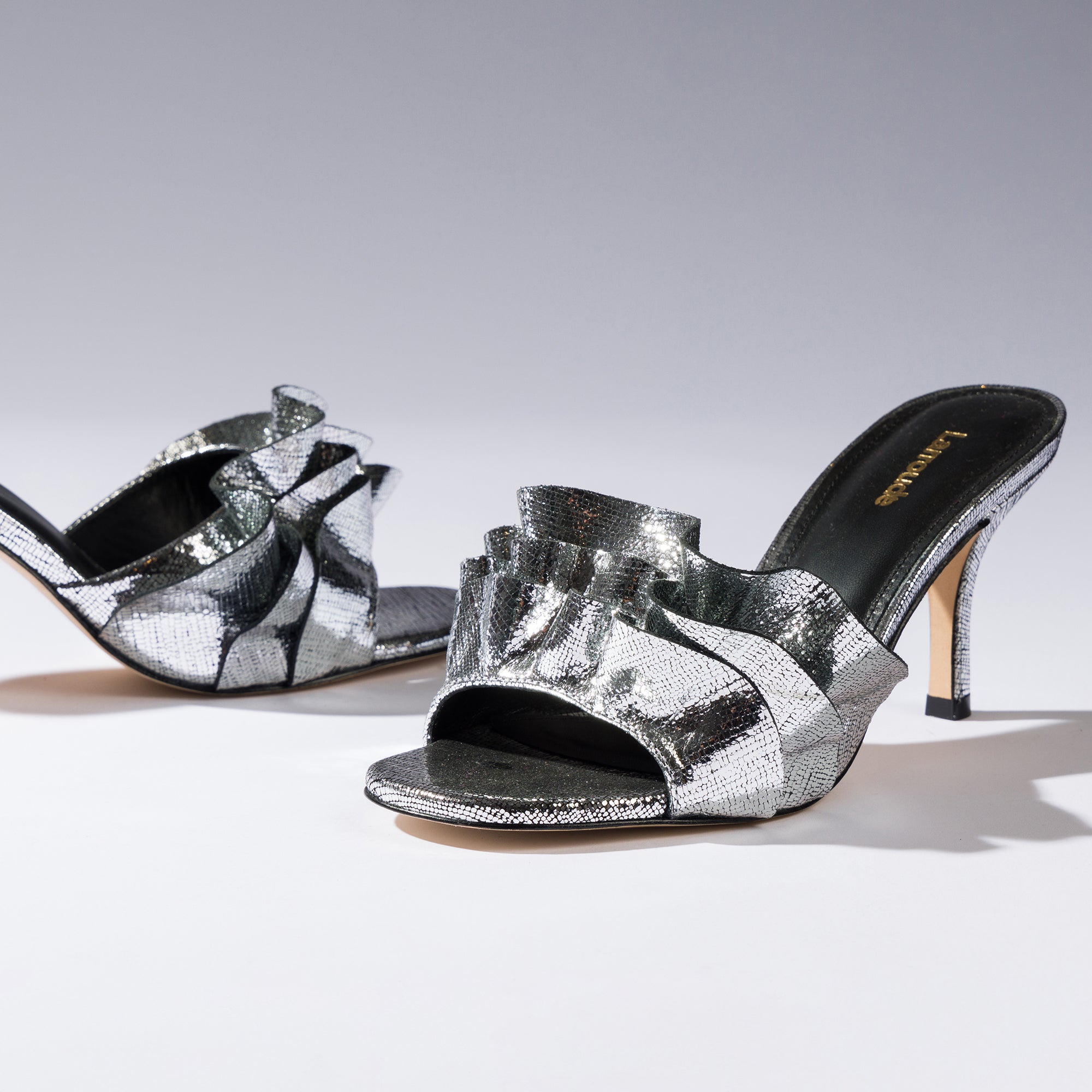 Colette Ruffle Mule In Silver Cracked Metallic Leather by Larroudé