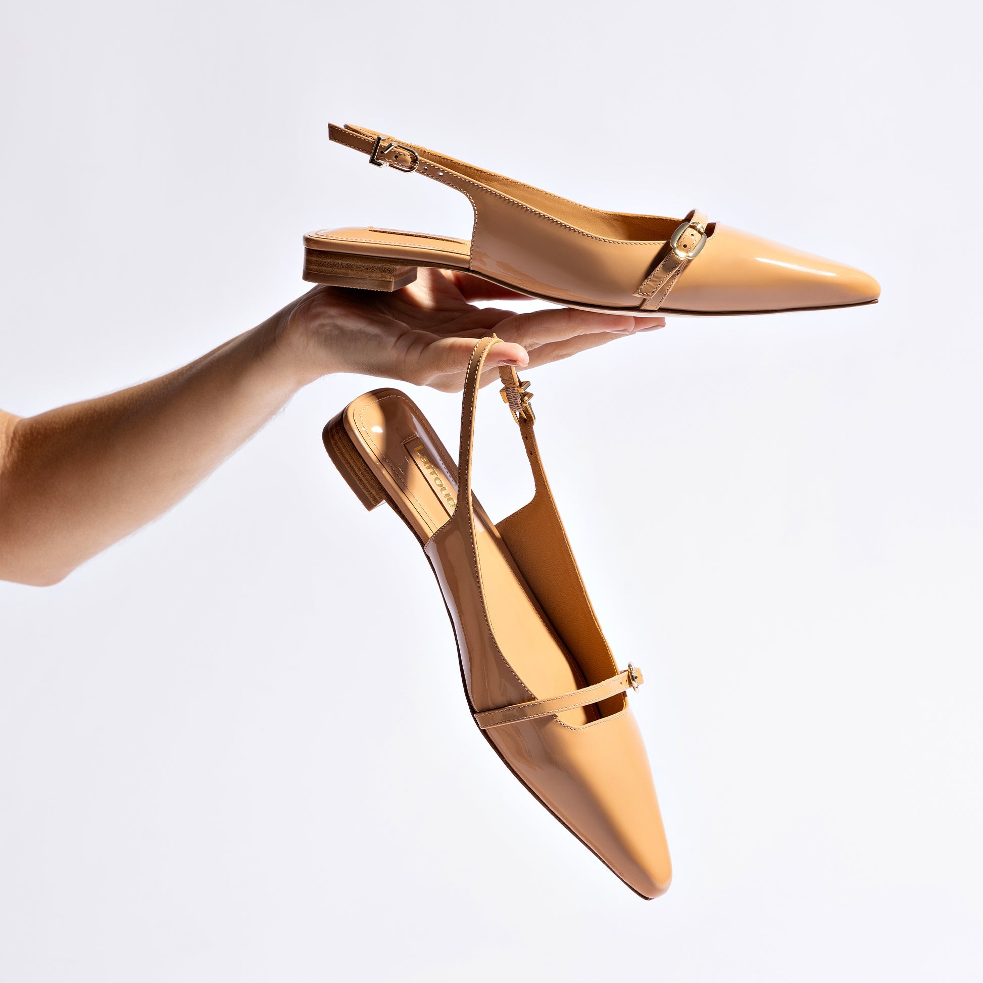 Ines Flat In Tan Patent Leather by Larroudé