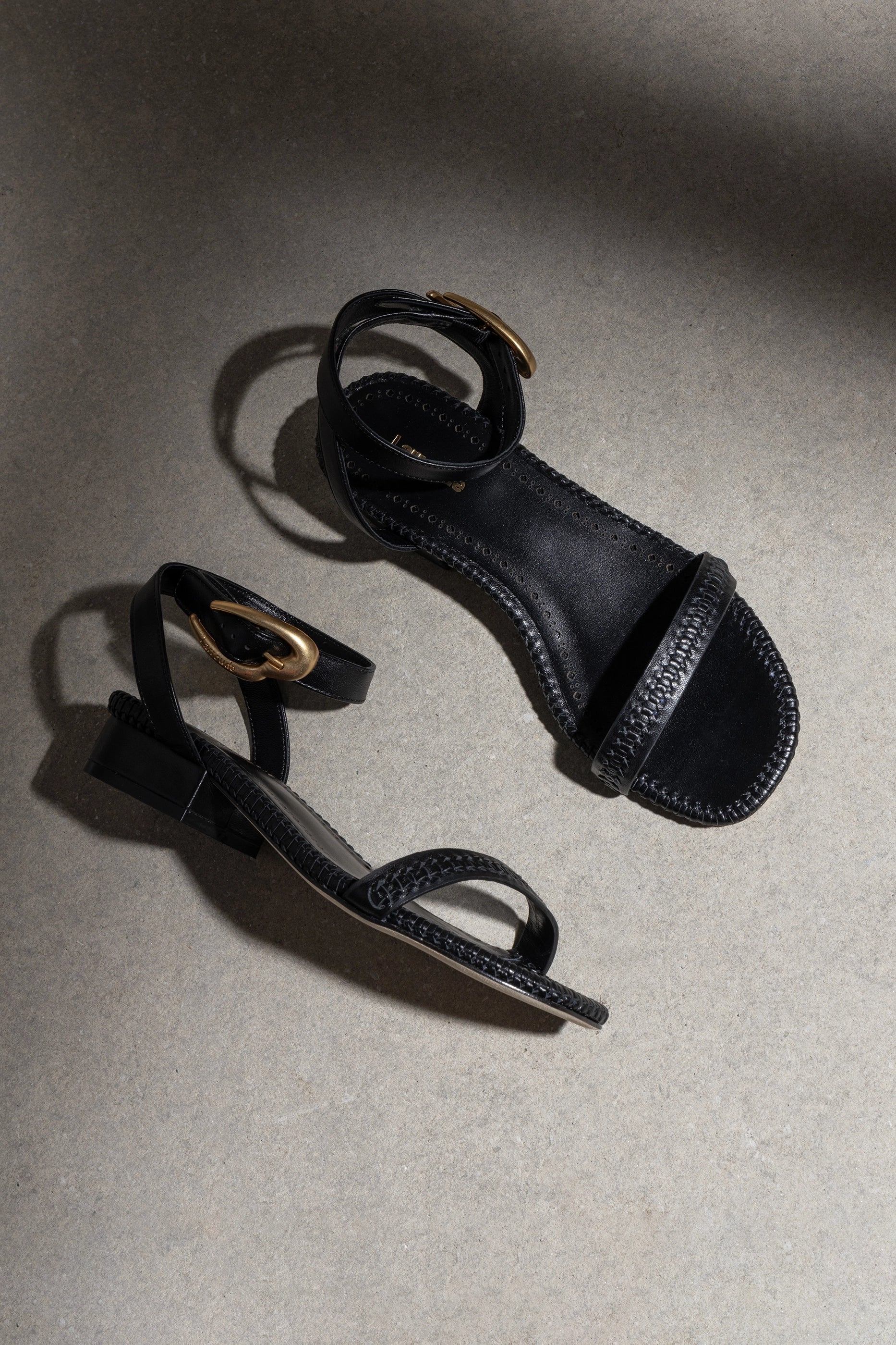 Verona Flat Sandal In Black Leather by Larroudé