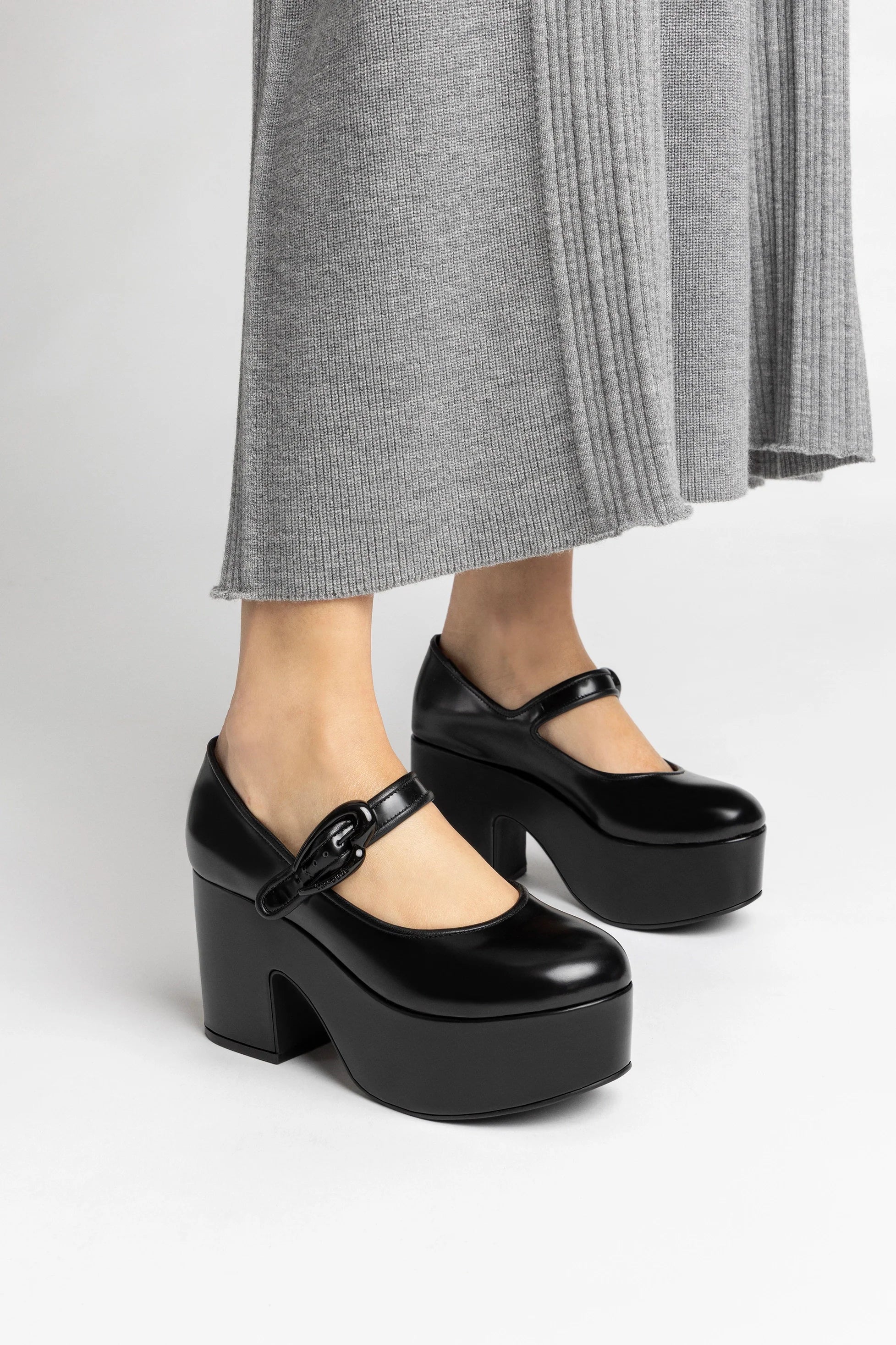 Verona Flatform In Black Box Leather by Larroudé