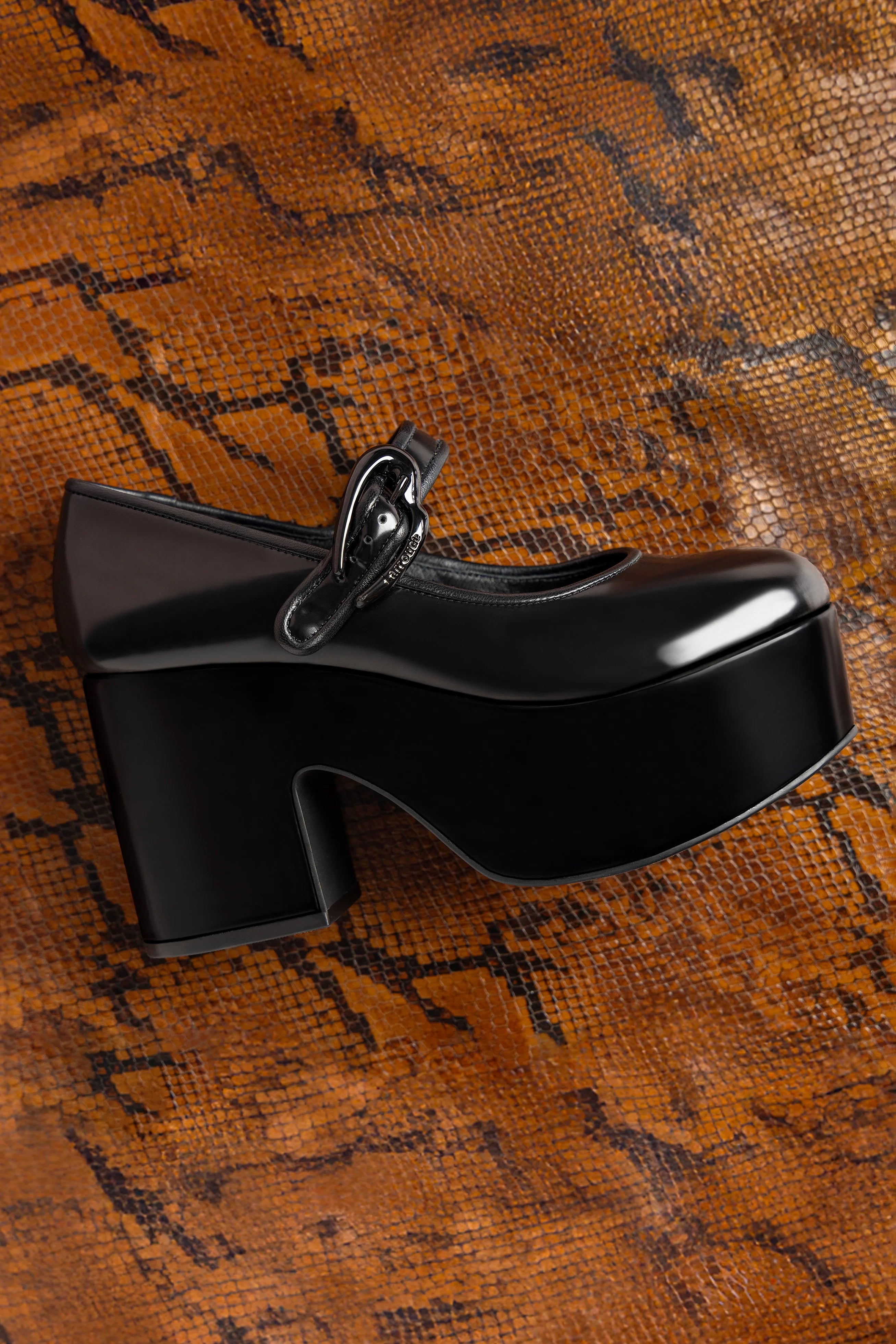 Verona Flatform In Black Box Leather by Larroudé