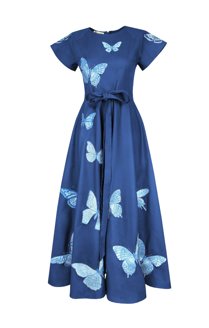 A blue midi dress with a matching waist tie, featuring a butterfly print in light blue and white, shown against a plain white background.