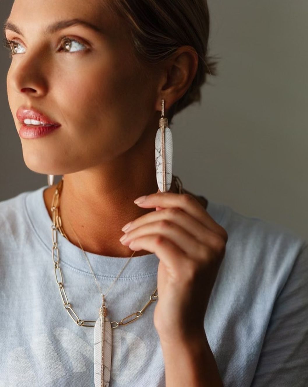 14k Carved Howlite Feather Earrings by S. Carter Designs