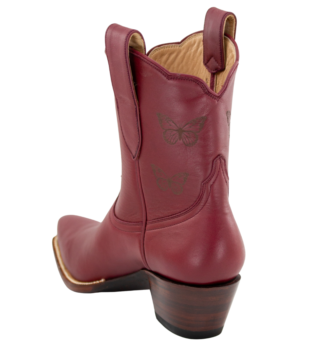 Red cowboy boot with butterfly design on a white background