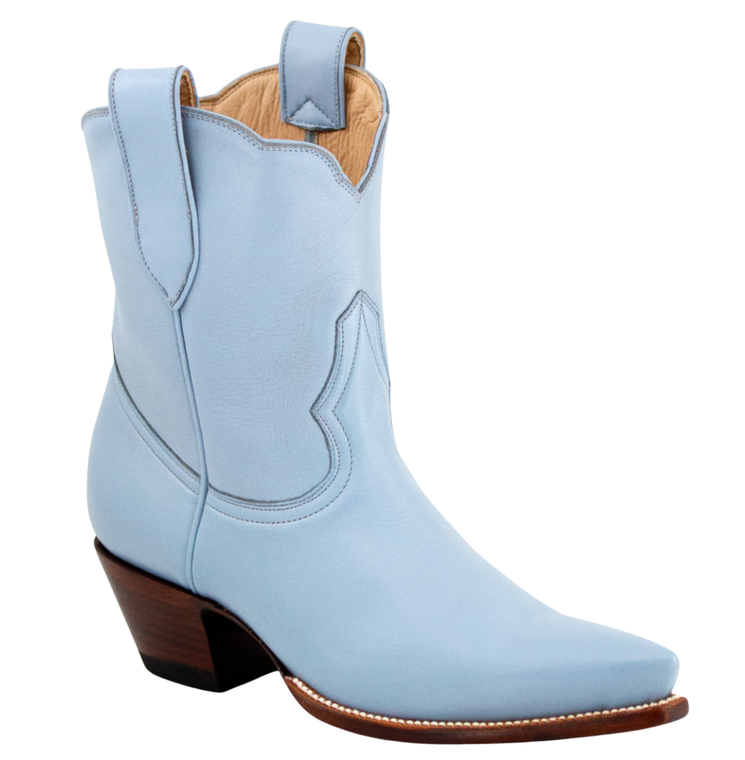 Light blue cowboy boot with brown heel and sole on a white background