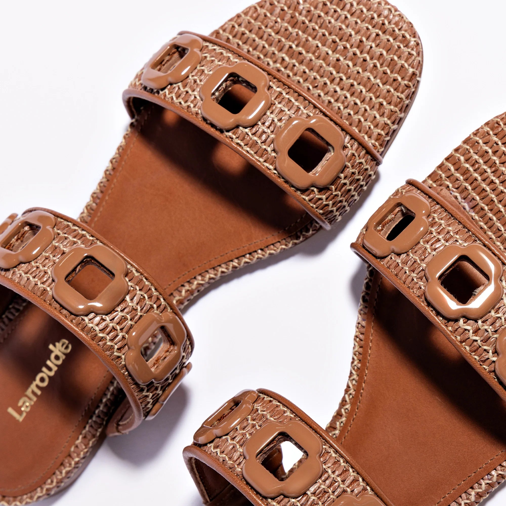 Milan Flat Mule In Caramel Wave Raffia by Larroudé