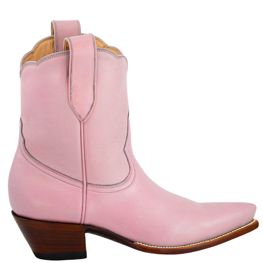 Pink cowboy boot on a white background