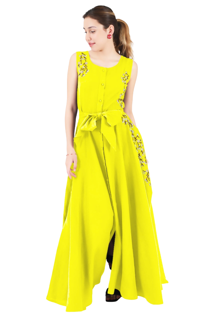 Woman wearing a bright yellow sleeveless dress with floral embellishments on a white background