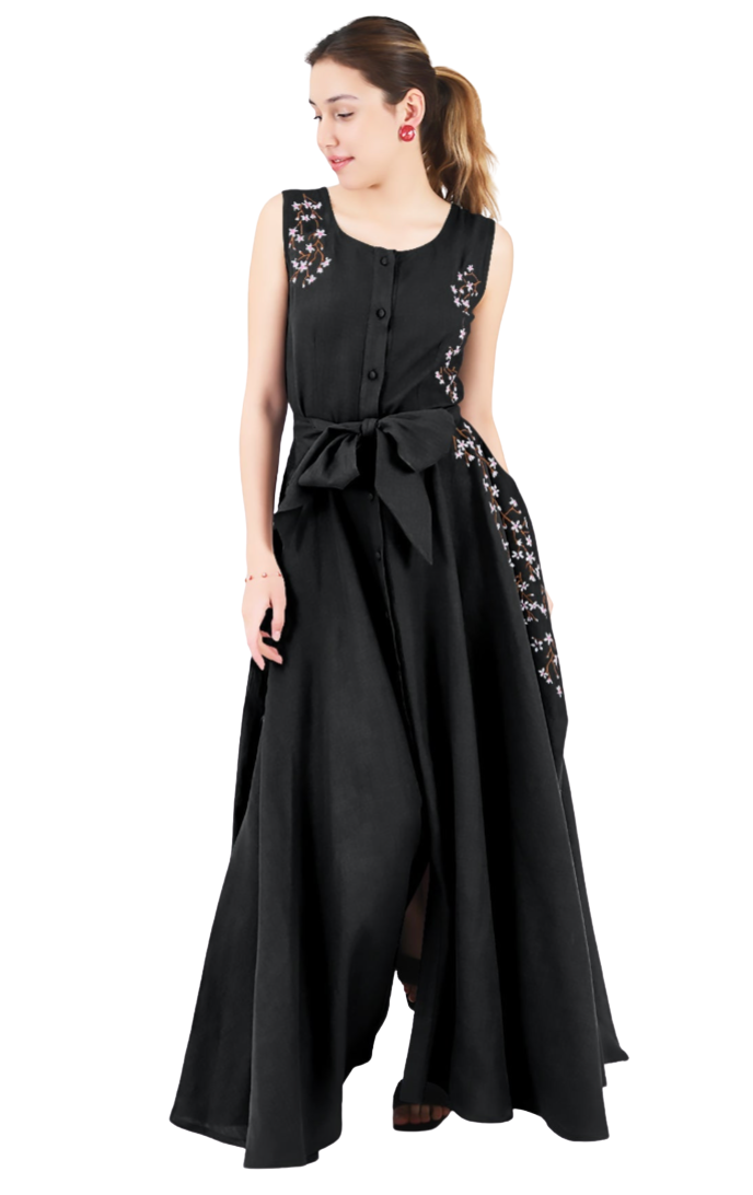 Woman wearing a black sleeveless dress with floral embellishments on a white background